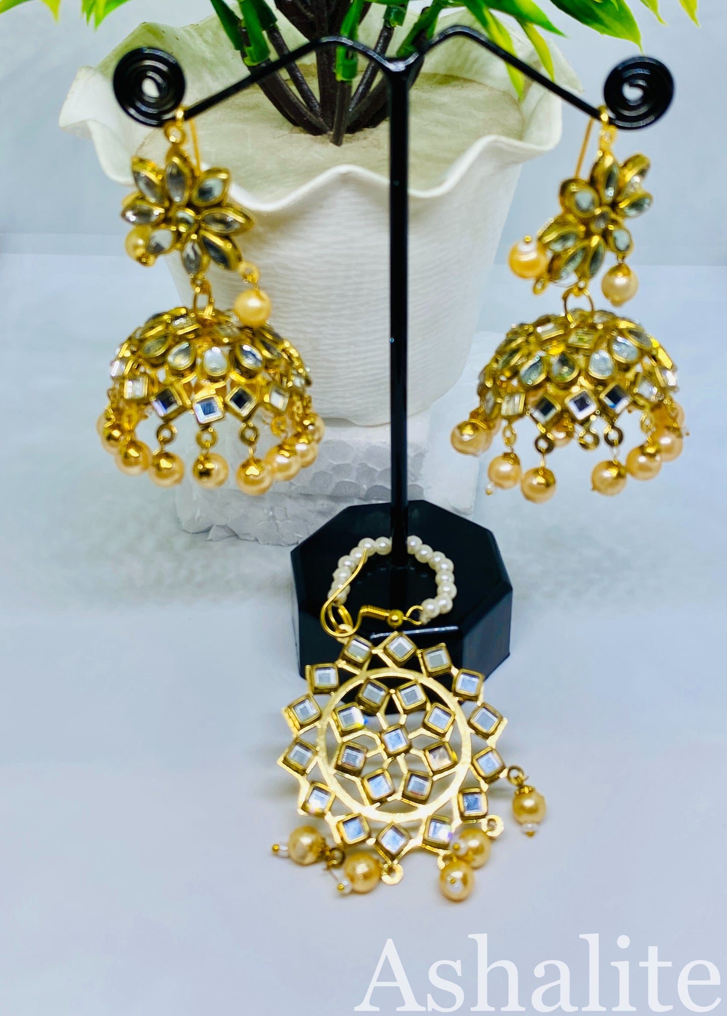 सुभांगी Gold-Plated Kundan Jhumka Earrings with Maang Tikka Set