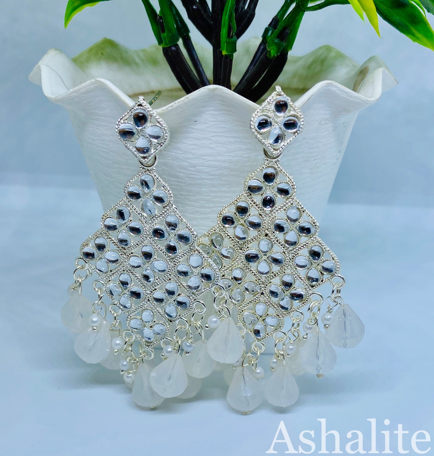 दामोदर प्रिया Iridescent Milky White Chandbali Earrings with Floral Accents