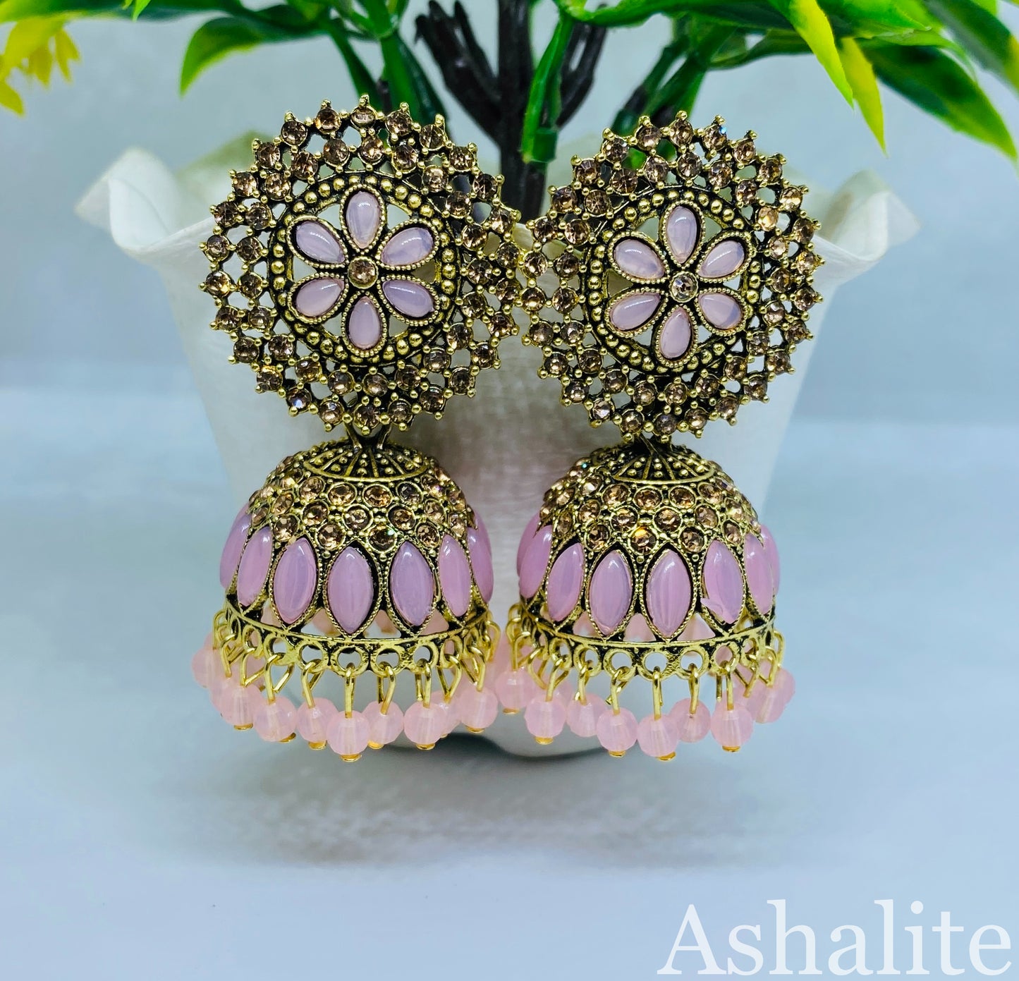 कमल-सुंदरी Antique Gold-Plated Pink Jhumka Earrings with Floral Motif