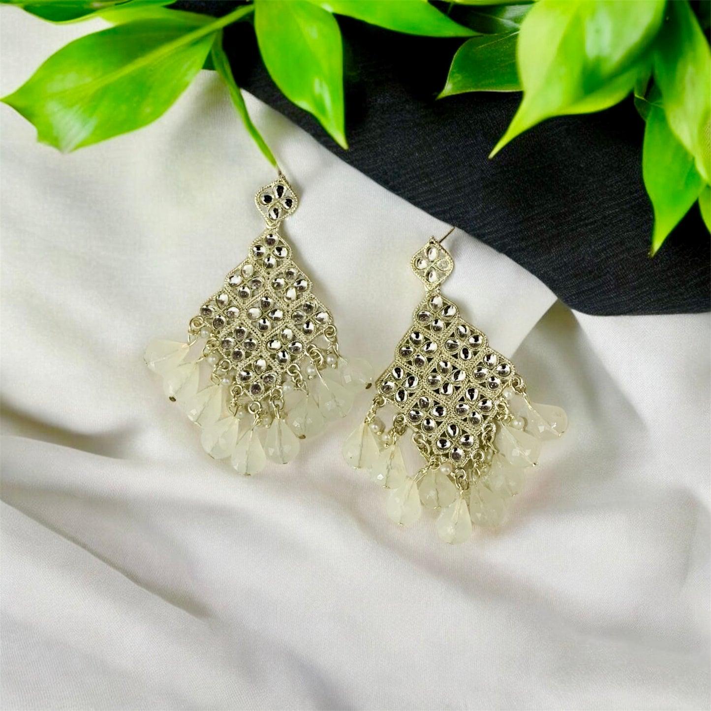 दामोदर प्रिया Iridescent Milky White Chandbali Earrings with Floral Accents