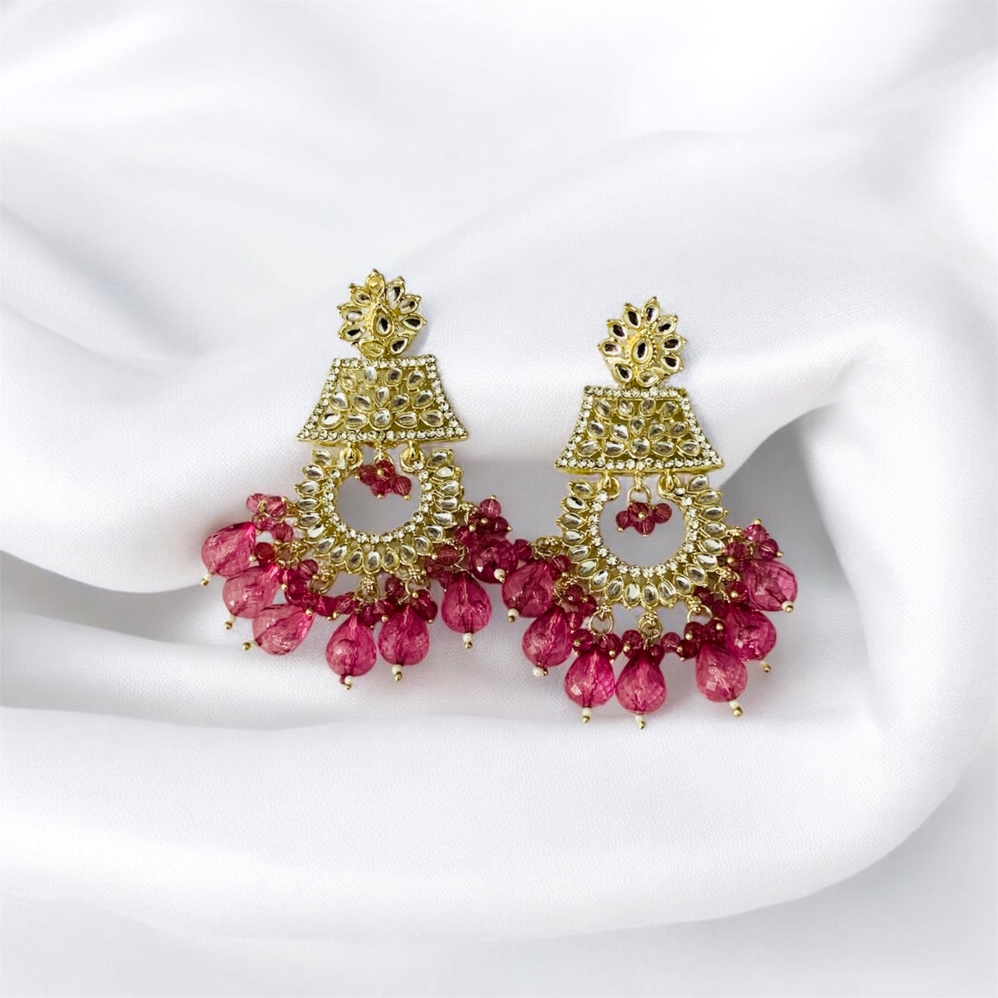 कृष्ण संयुता Gold-Plated Chandbali Earrings with Fuchsia Pink Beads and Floral Design