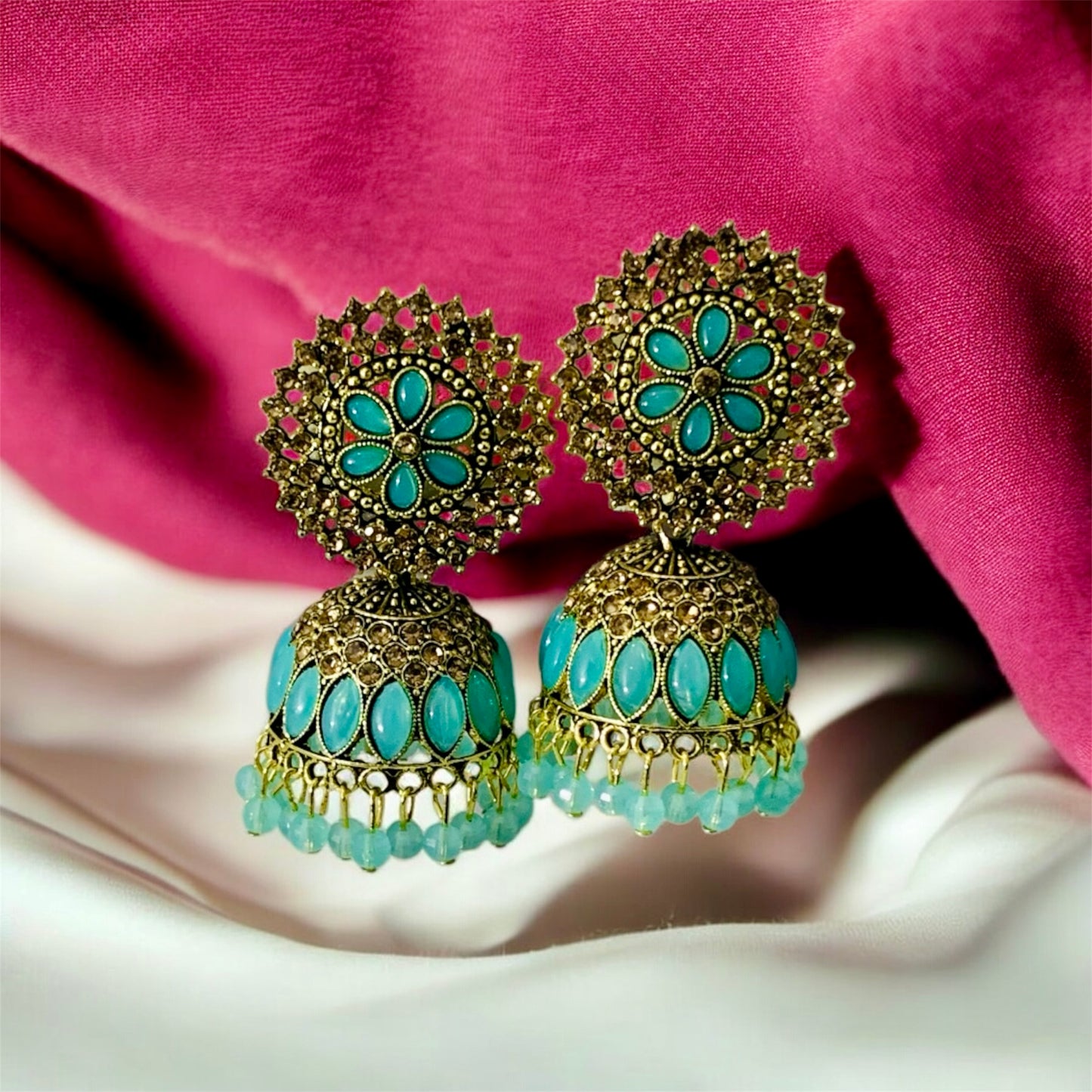 सौम्या-रूपा Turquoise and Gold Plated Jhumka Earrings