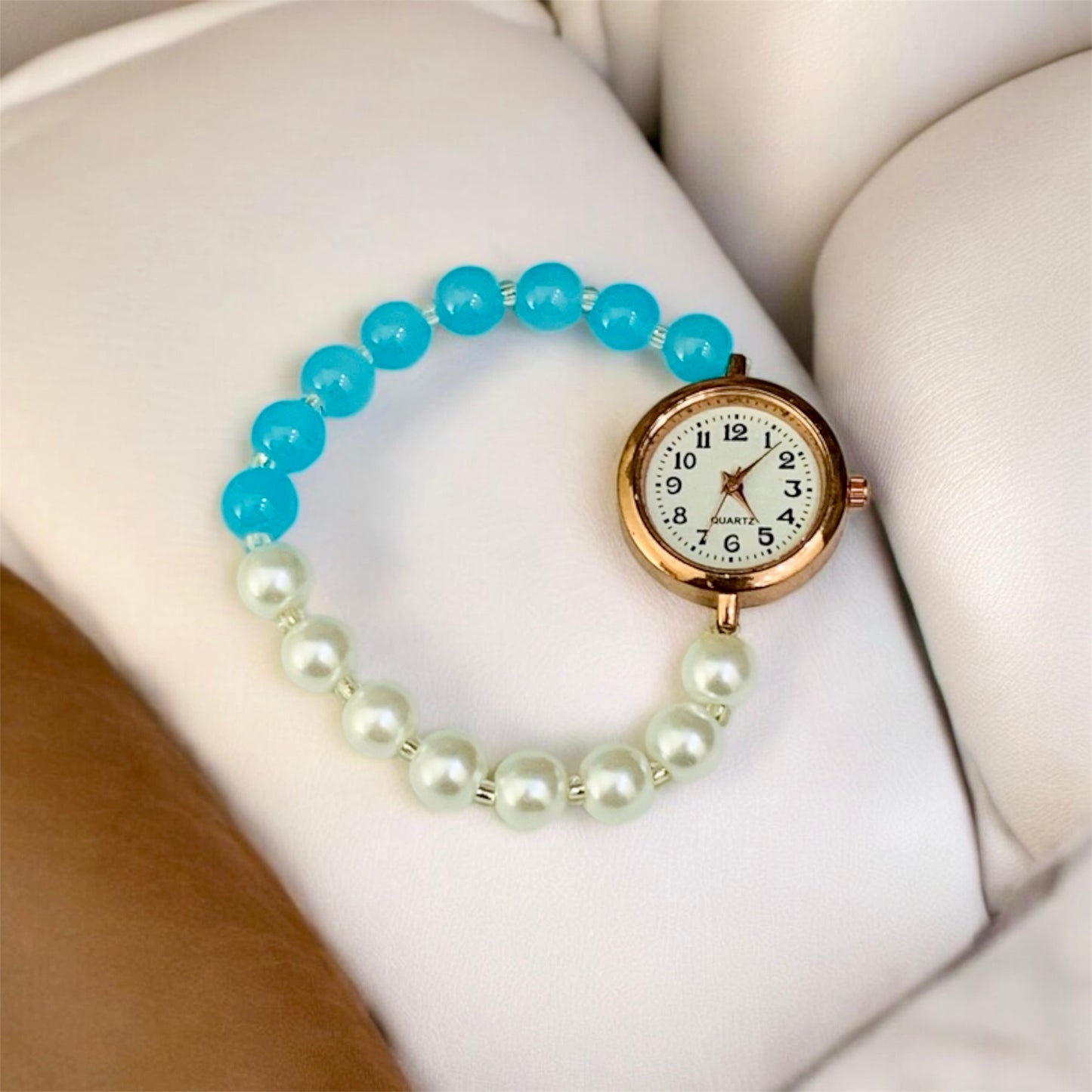 अंबिका Sky Blue & Silver Pearls Bead Bracelet with Rose Gold Dial Watch