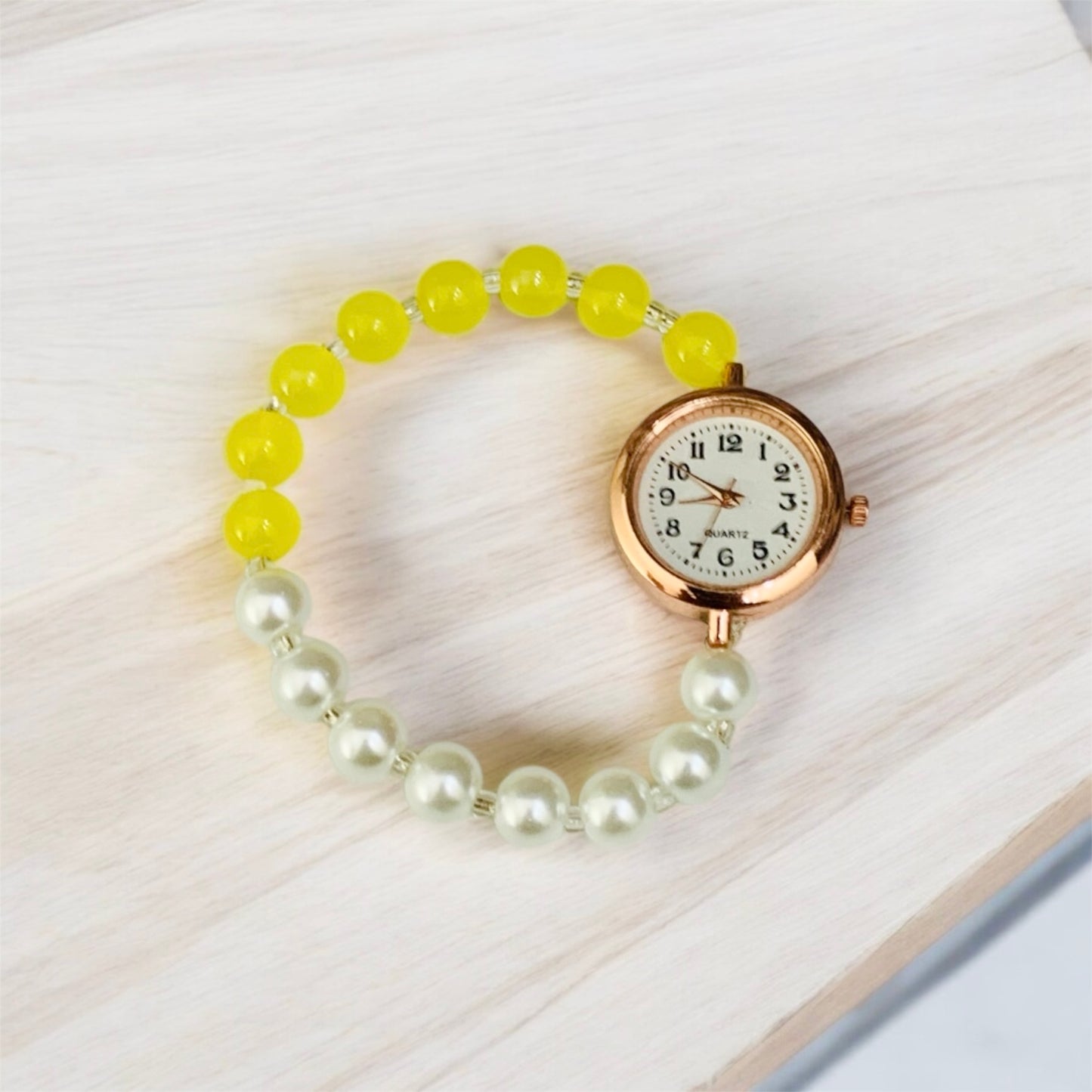 चंद्रिका Yellow & Silver Pearls Bead Bracelet With Rose Gold Dial Watch