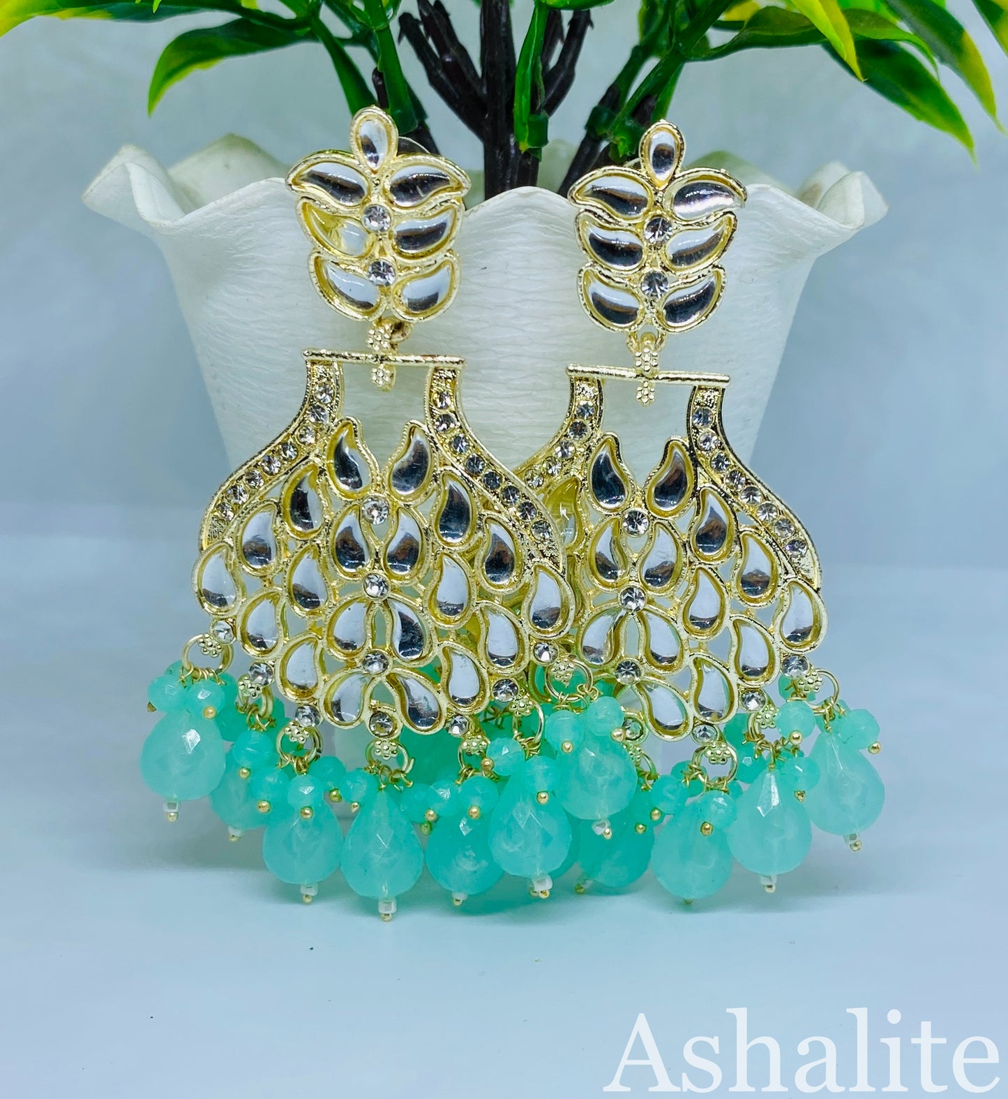 श्री जी Elegant Gold-Plated Kundan & Mint Green Crystal Chandbali Earrings