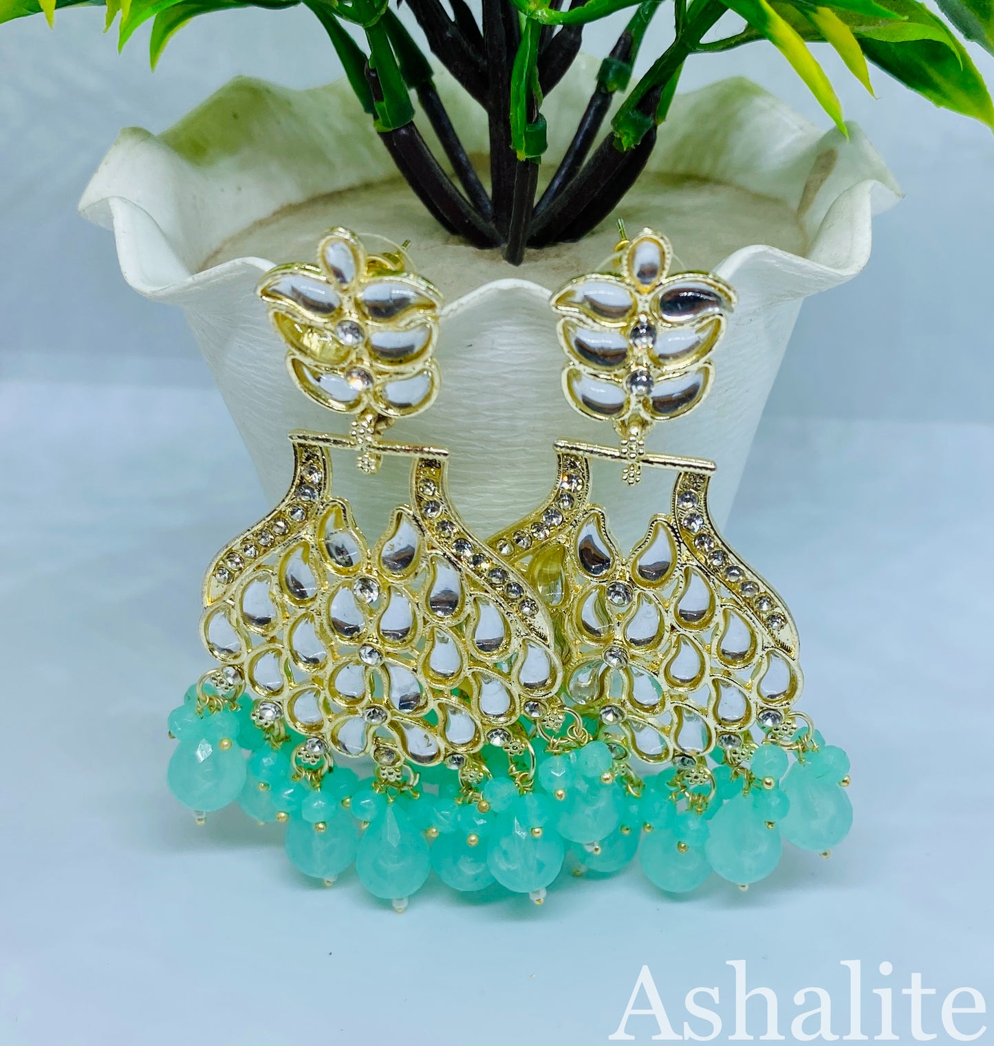 श्री जी Elegant Gold-Plated Kundan & Mint Green Crystal Chandbali Earrings