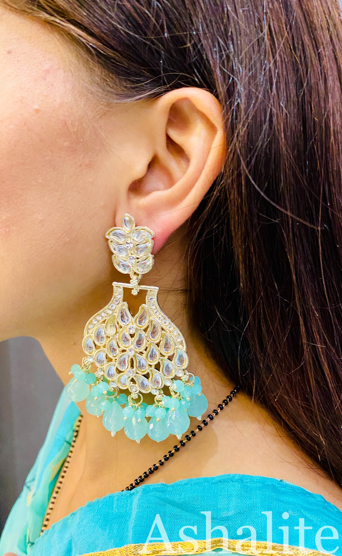 श्री जी Elegant Gold-Plated Kundan & Mint Green Crystal Chandbali Earrings