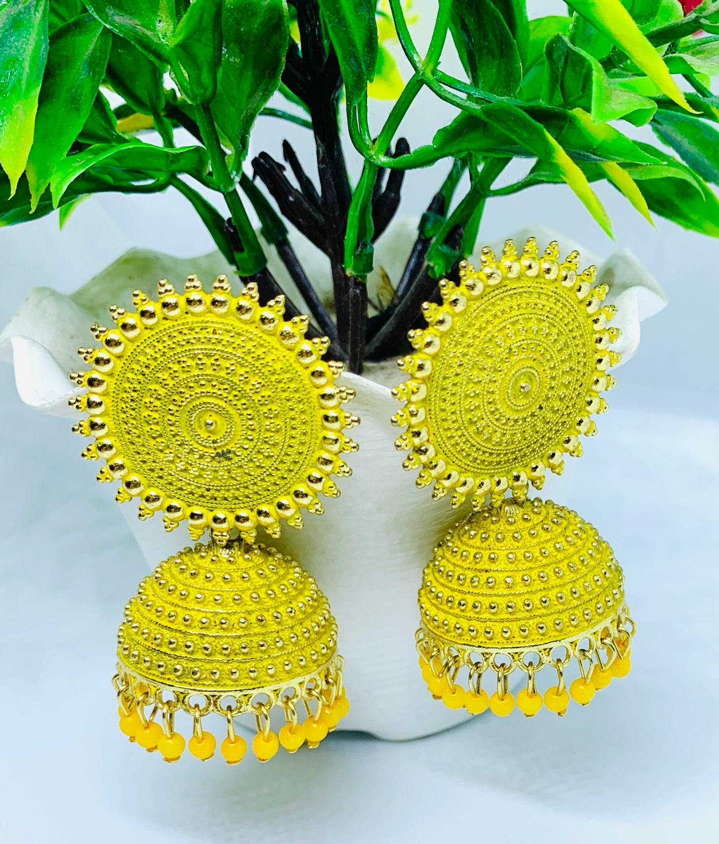 Elegant Yellow Jhumka Earrings with classy Beads