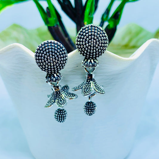 “Antique Silver Plated Floral Drop Earrings with Textured Detailing”