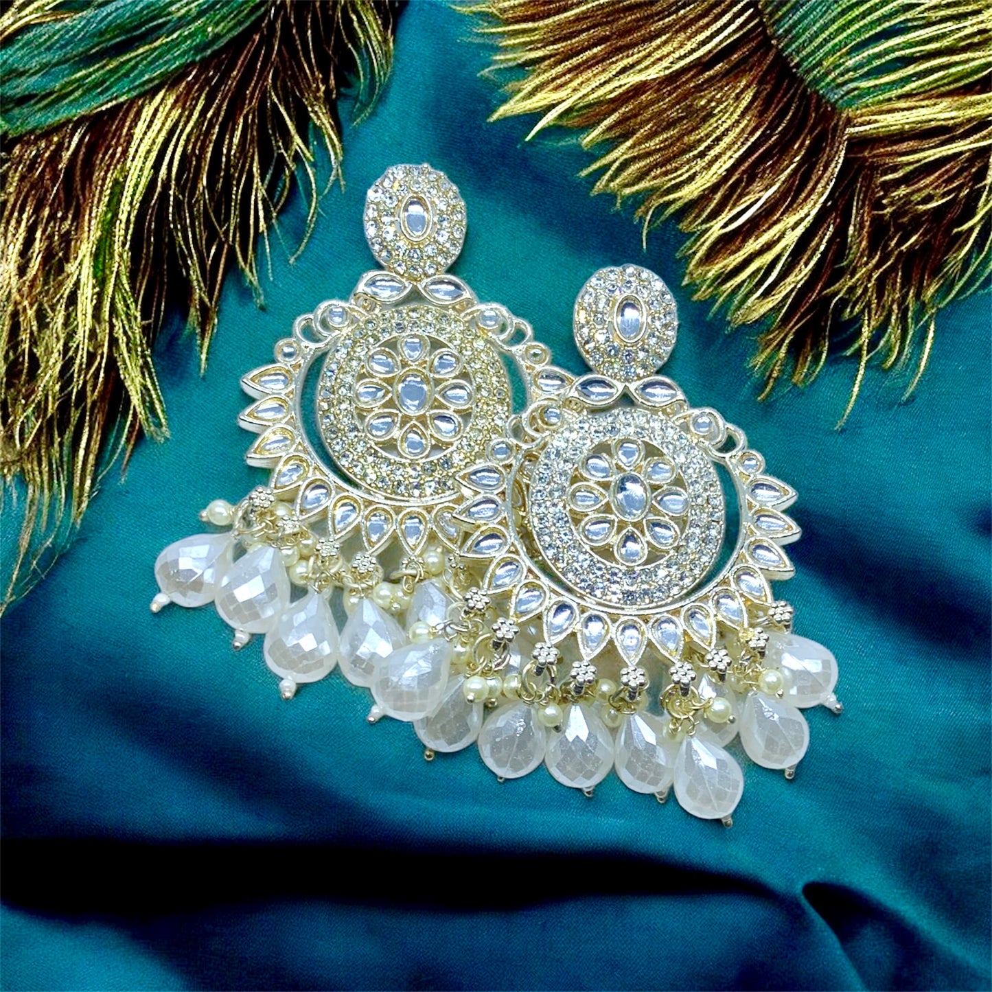 वृन्दा Premium Divine Crystal Kundan Pearl Chandbali