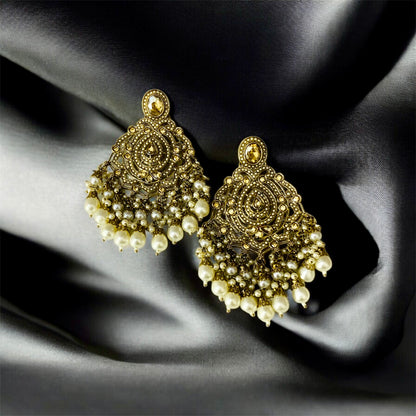 Close-up of Banke Bihari golden pearl chandbali detail — buy premium earrings India