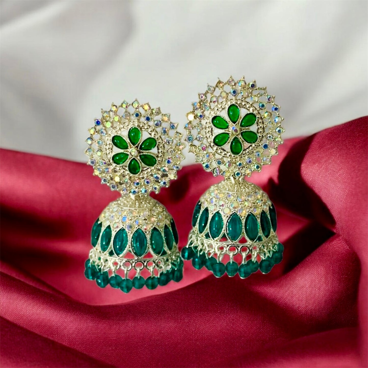 नित्या Stunning Green and Silver-Plated Jhumka Earrings
