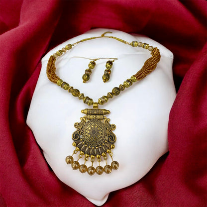 Close-up of Satyabhama tribal pendant necklace detail — artificial jewellery India
